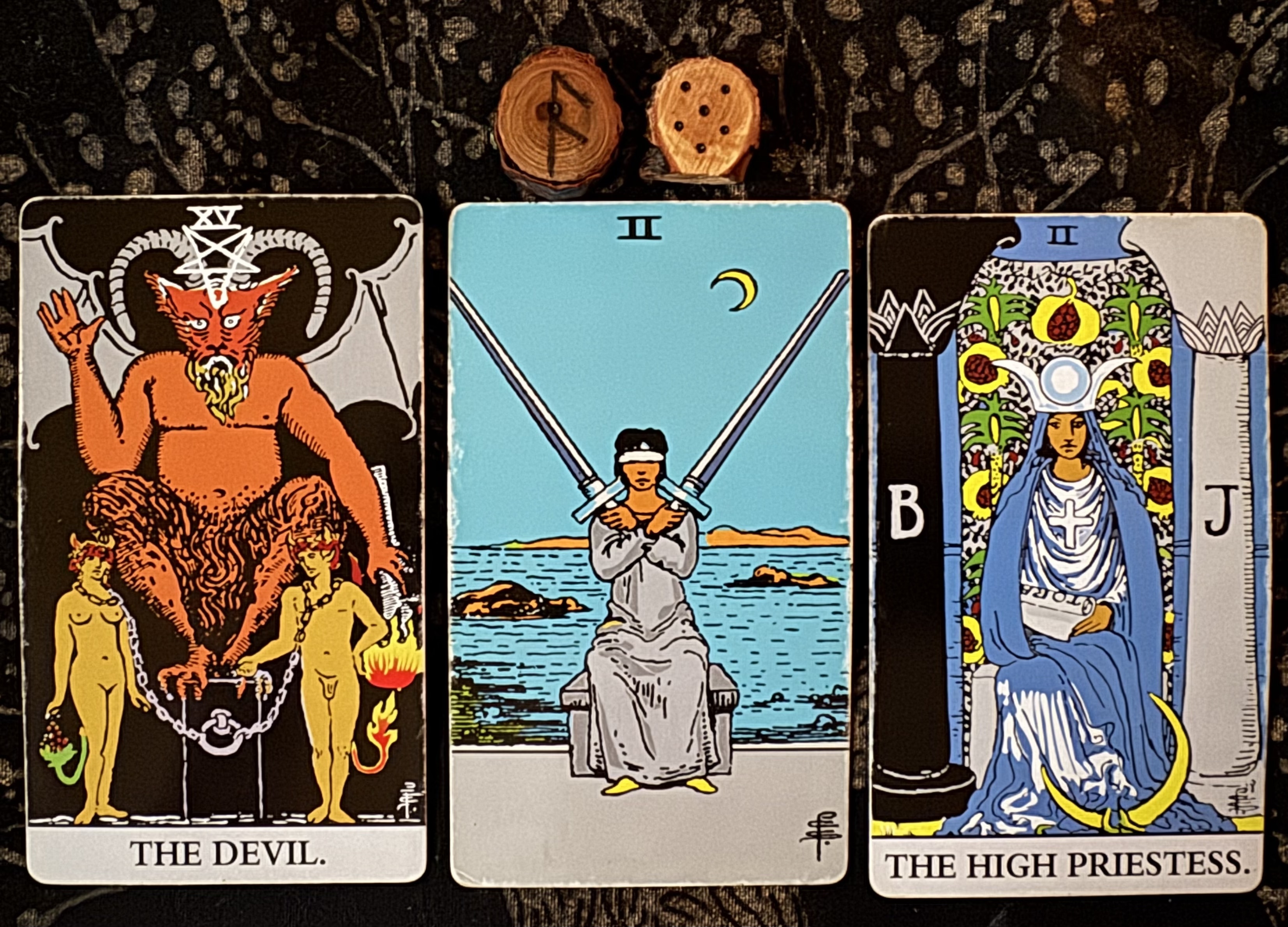 Runes: Ansuz, Acquisitio
Cards: The Devil, 2 of Swords, The High Priestess