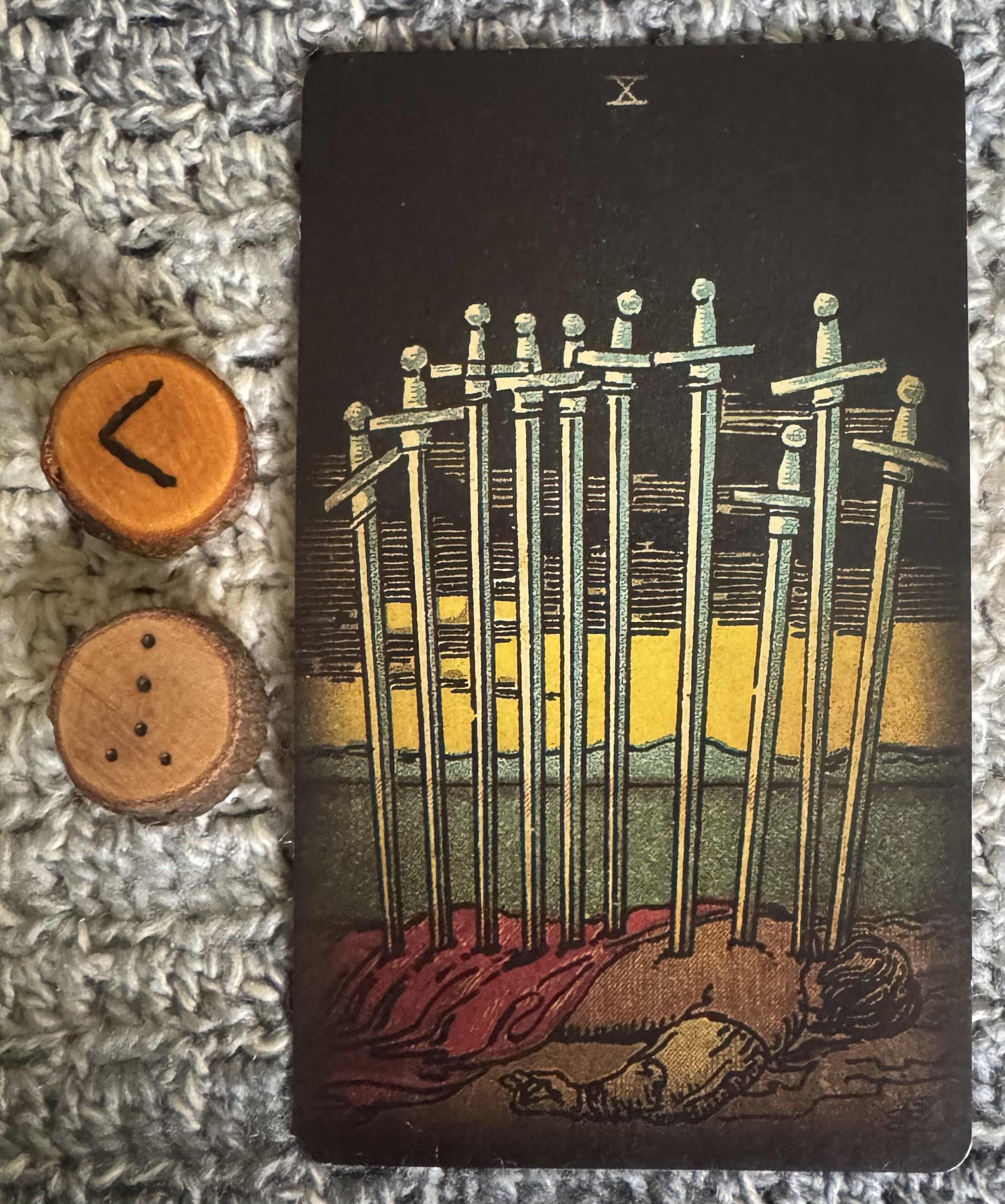 Runes: Kenaz, Cauda Draconis
Card: 10 of Swords