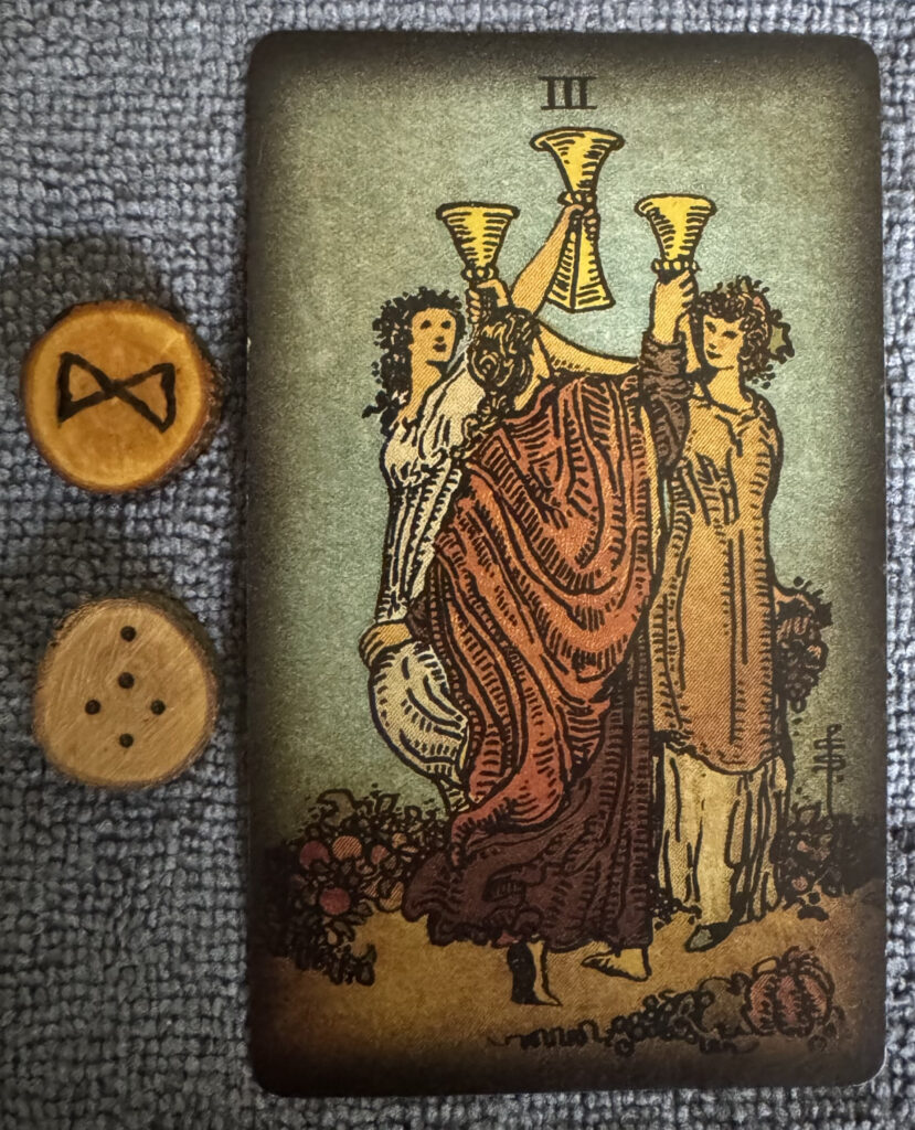 Runes: Dagaz, Puer
Card: 3 of Cups